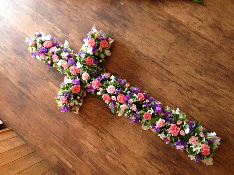 Casket cross in pinks and mauves