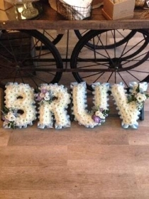 'BRUV', Based in white, pale blue ribbon.