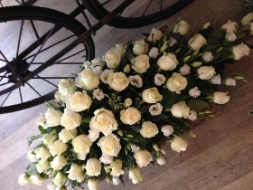 White rose casket spray